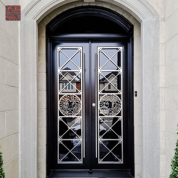 Black double door with custom stainless steel design